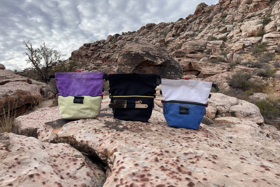 Three Sesh chalk bucket colorways on the rock