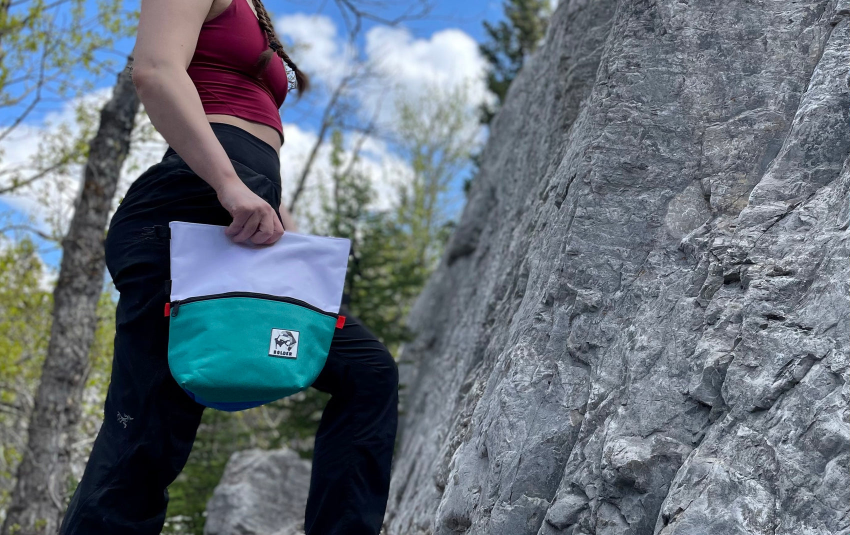 Climber with Sesh chalk bucket
