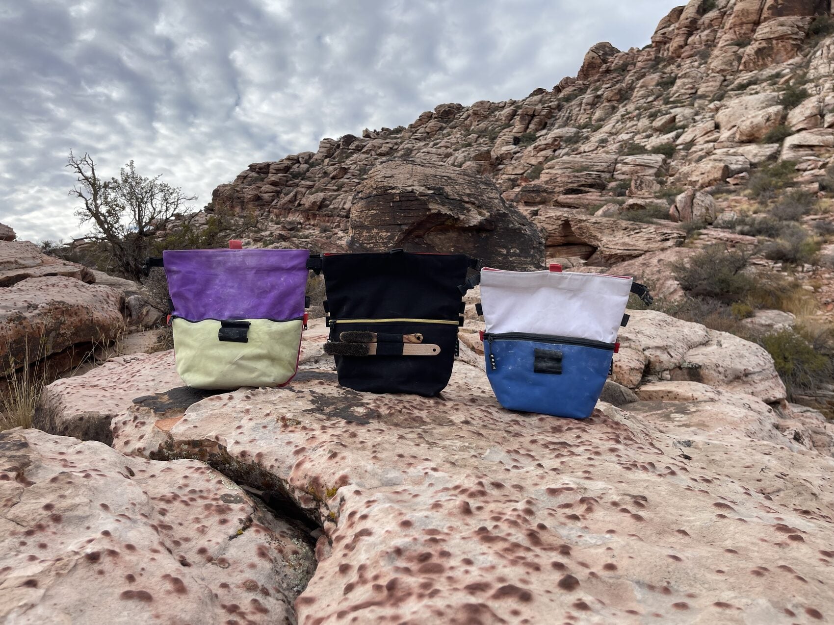 Three Sesh bucket colorways on the rock